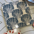 Load image into Gallery viewer, Salty Days - coastal drink coasters set of 4 featuring blue shell designs on a white background.