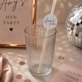 Load image into Gallery viewer, Hen party paper straws personalised toppers in a glass with decorative label for hen celebrations.