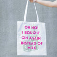 Load image into Gallery viewer, Funny gin tote bag with playful text "Oh no! I bought gin again instead of milk" on a white background.