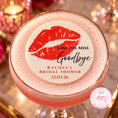 Load image into Gallery viewer, A pink frothy cocktail in a coupe glass with a round white topper featuring red lips and the text 'KISS THE MISS Goodbye Rachel's Bridal Shower 22.03.