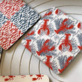 Load image into Gallery viewer, Salty Days - coastal drink coasters set of 4 with vibrant coral and blue designs of shells and lobsters.
