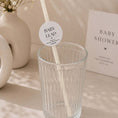Load image into Gallery viewer, Personalised baby name paper straw toppers displayed in a glass at a baby shower event.