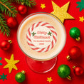 Load image into Gallery viewer, Candy Cane Christmas edible drink toppers on a festive cocktail with holiday decorations.