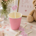Load image into Gallery viewer, Baby feet blue pink paper straw toppers in a pink cup on a table with a teddy bear and decorations.