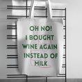 Load image into Gallery viewer, Funny wine tote bag with humorous text about choosing wine over milk, perfect for wine lovers.