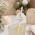 Load image into Gallery viewer, Oh Baby Personalised paper straw toppers in a drink at a baby shower with floral decor and soft colors.