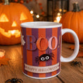 Load image into Gallery viewer, Boo Happy Halloween ceramic mug with playful design and festive colors, perfect for Halloween celebrations.