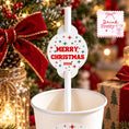 Load image into Gallery viewer, Merry Christmas Paper Straw Toppers pack of 24 displayed on a festive drink in a holiday setting.
