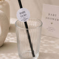Load image into Gallery viewer, Personalised baby name paper straw toppers in a clear glass for baby shower party decoration.