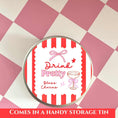 Load image into Gallery viewer, Bottle Charm Gift Tag in Drink Pretty storage tin with decorative design on pink checker background.