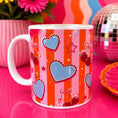 Load image into Gallery viewer, Personalised Initial Heart & Cherry Mug with colorful heart and cherry design on a vibrant pink background.
