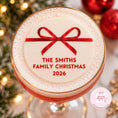 Load image into Gallery viewer, Christmas ribbon edible drink toppers on festive cocktail glass featuring family name and year.

