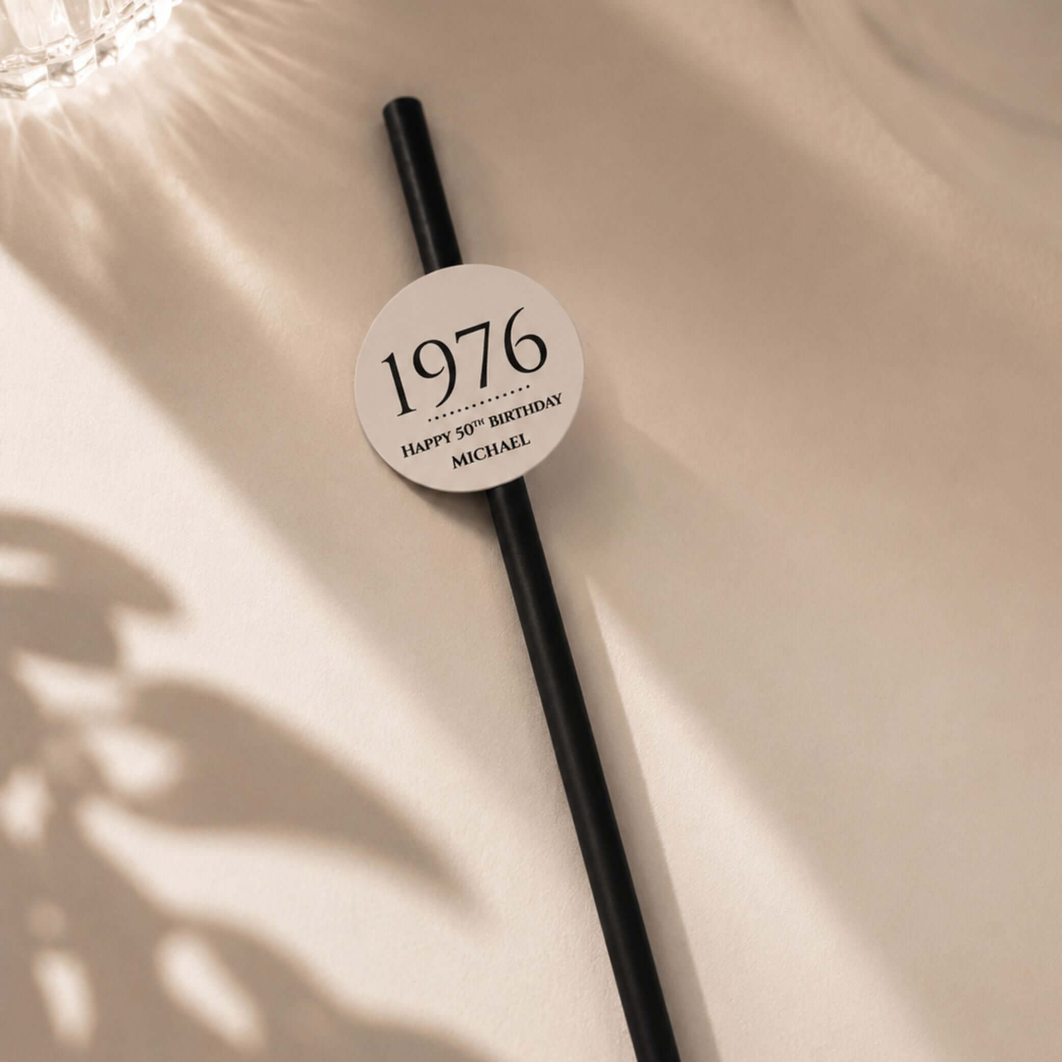 Personalised birthday year straw toppers featuring 1976 for a birthday celebration. Perfect for parties.