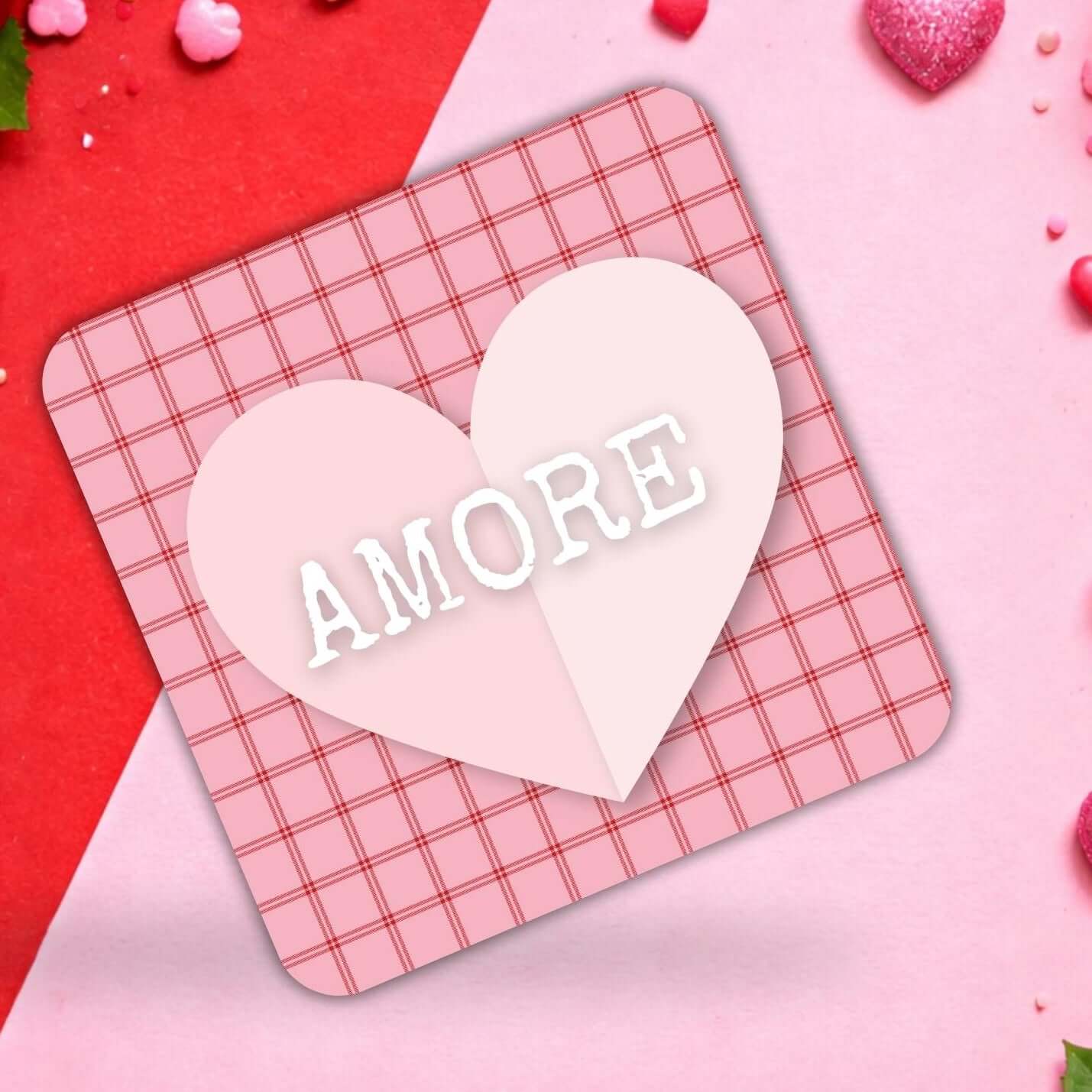 Pink heart coaster featuring a charming check pattern with 'AMORE' text, perfect for Valentine's Day celebrations.