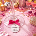 Load image into Gallery viewer, Decorative glass with a pink bow and personalised wine charm for hen party
