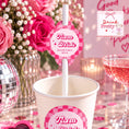 Load image into Gallery viewer, Team Bride Paper Straw Toppers in a pink-themed party cup for hen night celebrations, perfect for cocktails and fun drinks.
