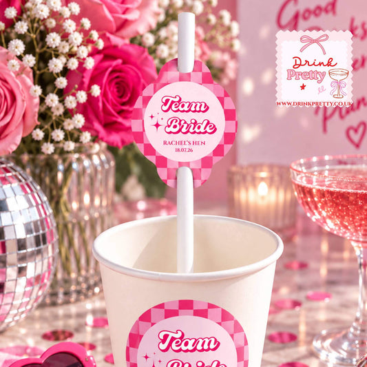 Team Bride Paper Straw Toppers in a pink-themed party cup for hen night celebrations, perfect for cocktails and fun drinks.
