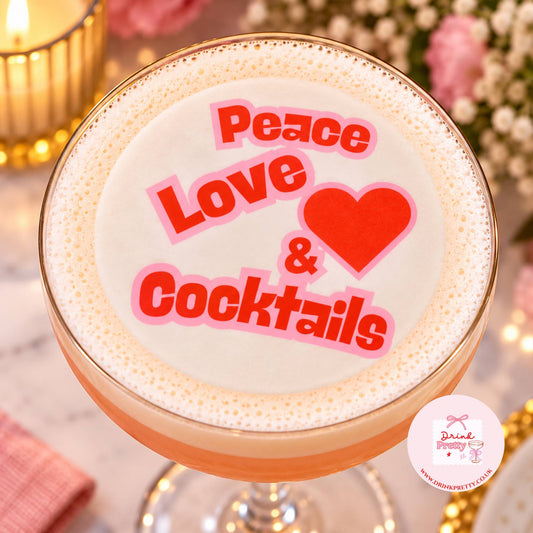 Peace Love & Cocktails edible drink topper on a stylish cocktail glass, perfect for celebrations.