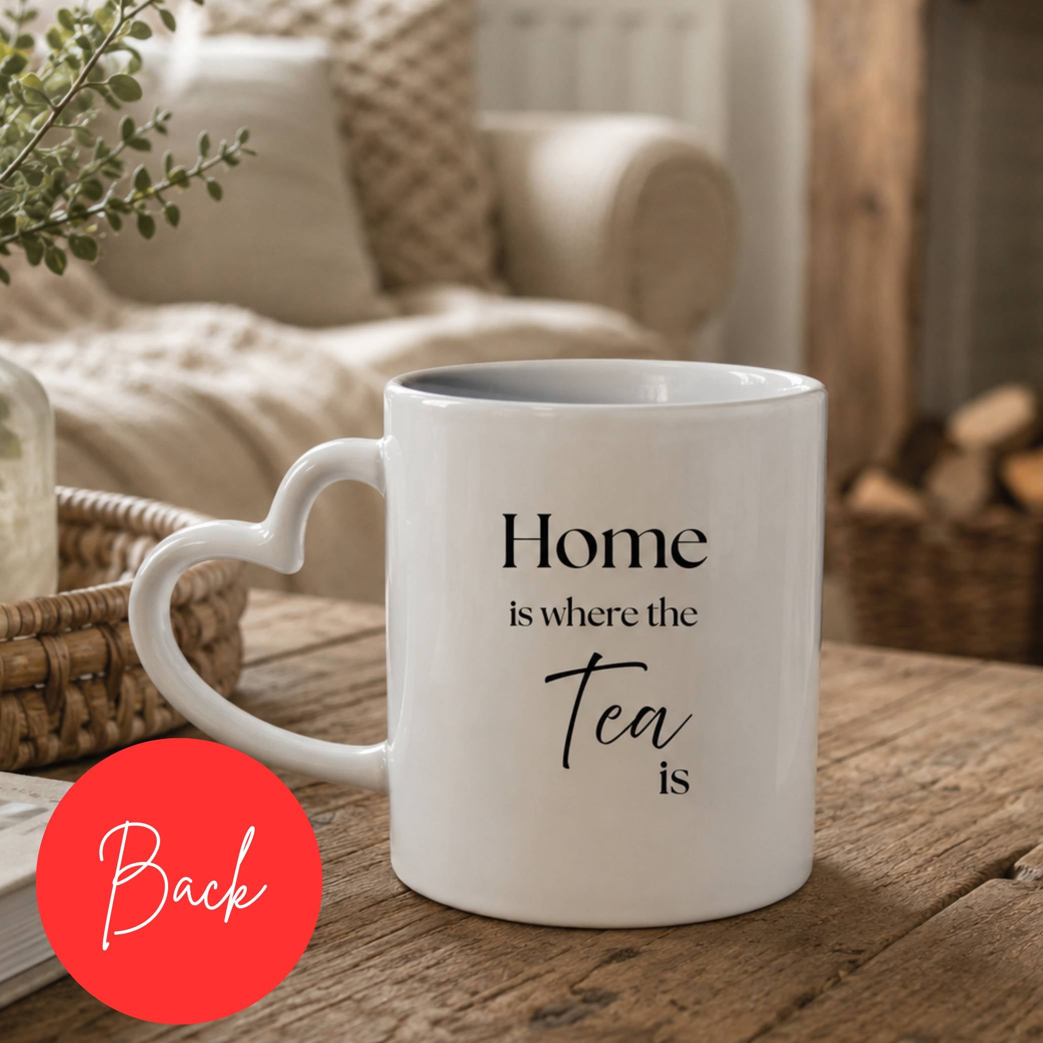 Back view of a personalised tea time mug with text 'Home is where the Tea is' on a cozy, homely setting.