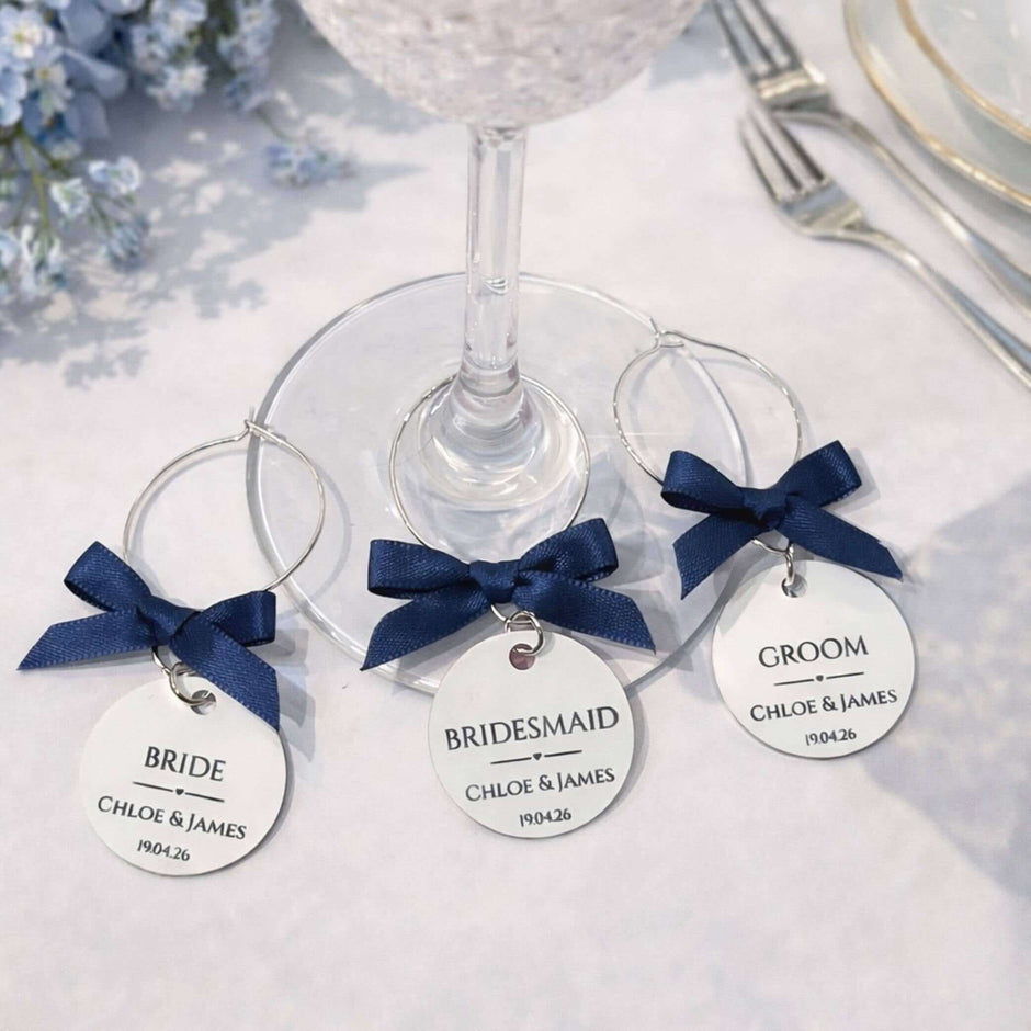 Wedding Wine Glass Charms For Bride & Co with personalized tags for bride, bridesmaid, and groom.