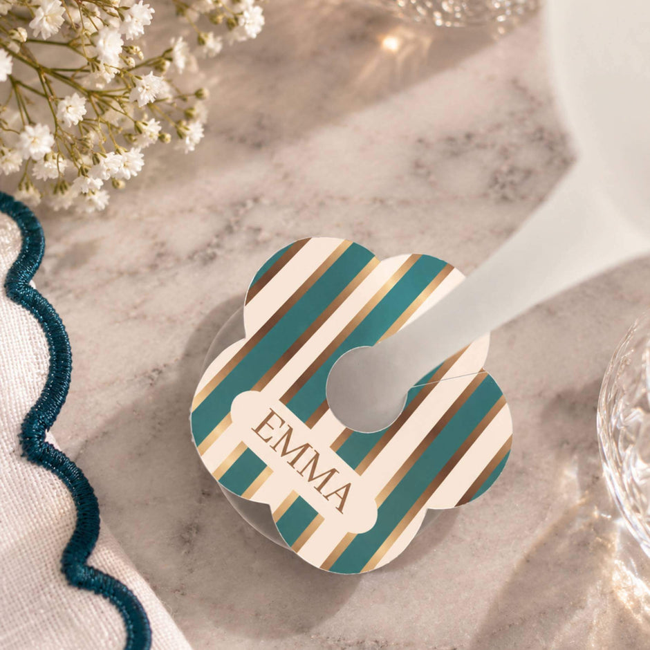 Tiffany blue & gold stripe personalised name drink markers with the name Emma in floral shape