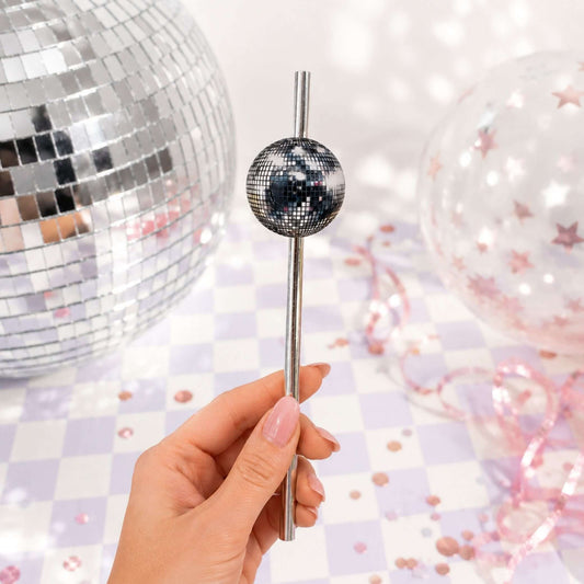 Disco ball paper party straw toppers showcasing a silver disco ball design, perfect for festive drink decor.