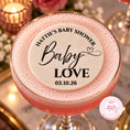 Load image into Gallery viewer, A pink frothy cocktail in a gold-rimmed coupe glass, topped with a round white foam insert that reads 'Hattie's Baby Shower Baby LOVE 03.10.
