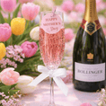 Load image into Gallery viewer, Edible drink toppers for Mother’s Day cocktails in a glass with pink bubbly drink and flowers.
