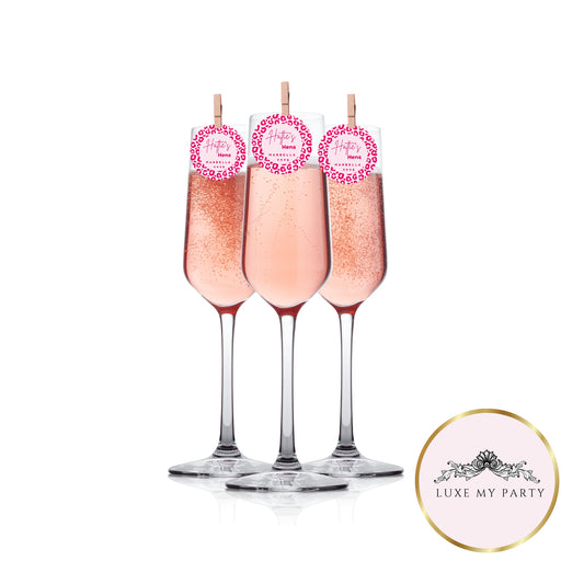 Personalised Wild Hen Edible Cocktail Toppers on elegant drinks for a bridal shower celebration.