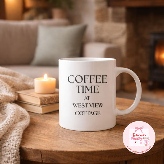 Personalised house number name coffee time mug on a wooden table with candle and cozy decor.