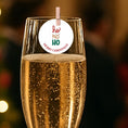 Load image into Gallery viewer, Ho Ho Ho Christmas edible drink toppers on a champagne glass for festive celebrations.
