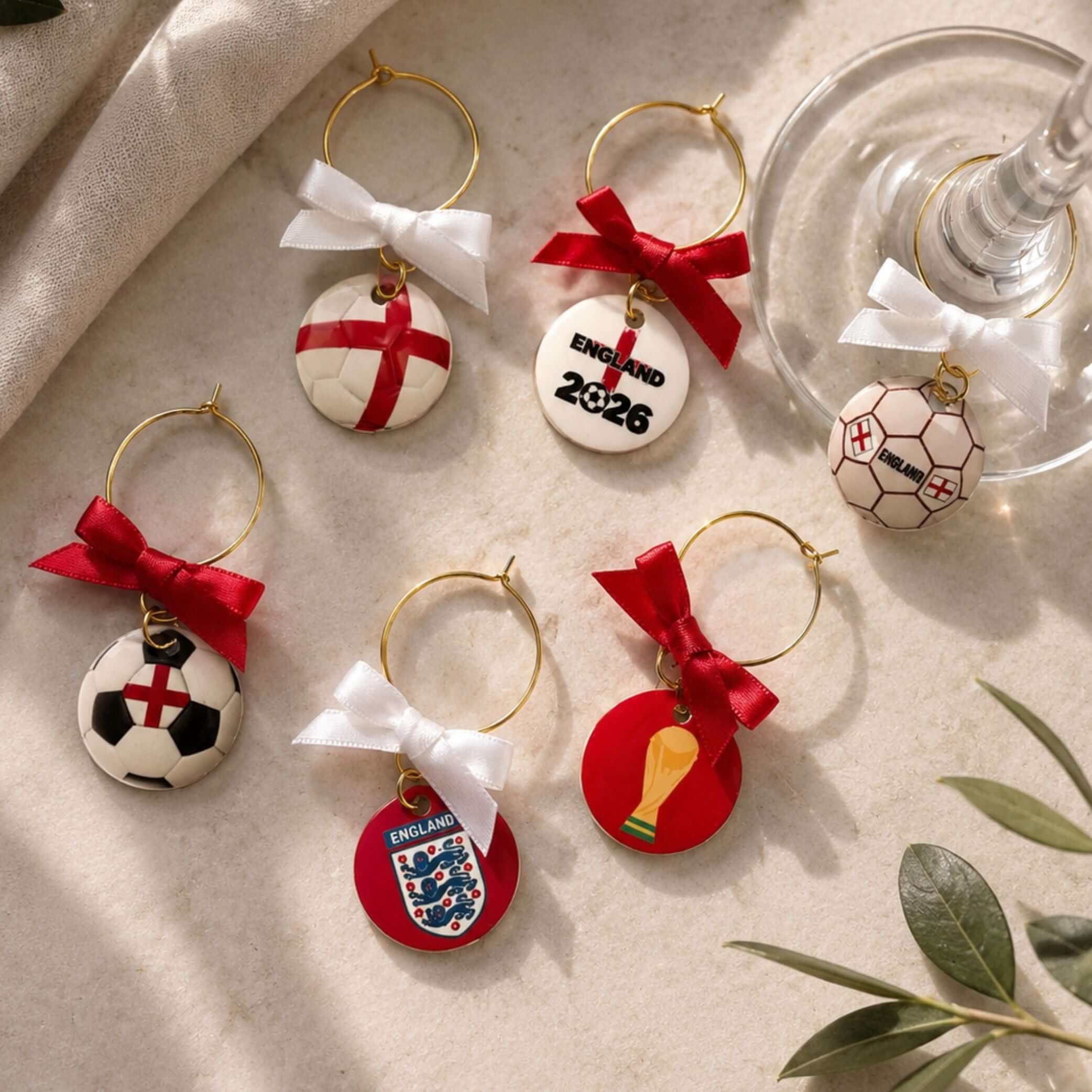 Tennis Ball Wine Glass Charms Set of 6 featuring football designs and satin ribbons.