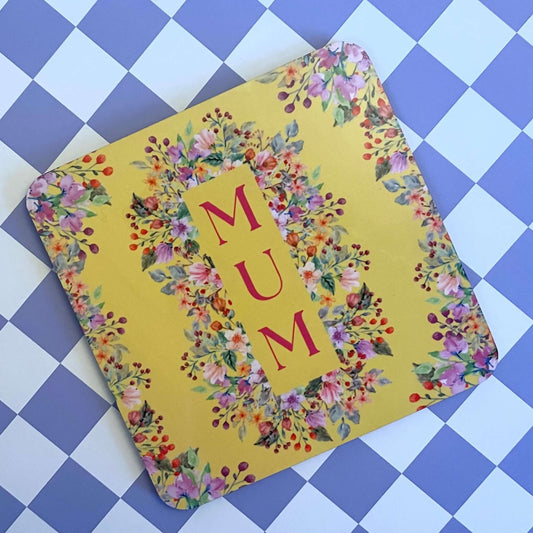 Blooms For Mum Floral Drink Coaster, vibrant yellow coaster with floral design, perfect for coffee tables.