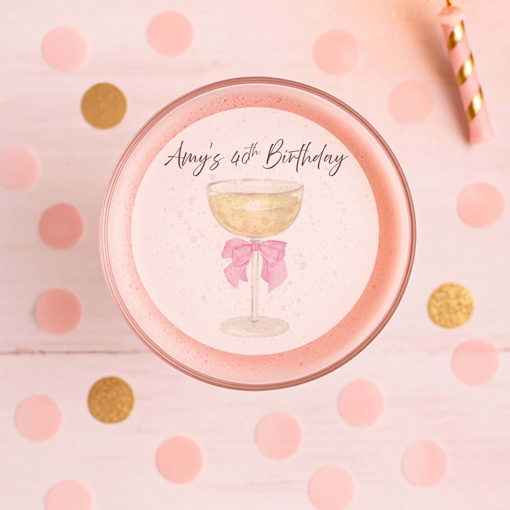 Sip & Celebrate Edible Cocktail Toppers on a pink birthday cocktail with decorative confetti.