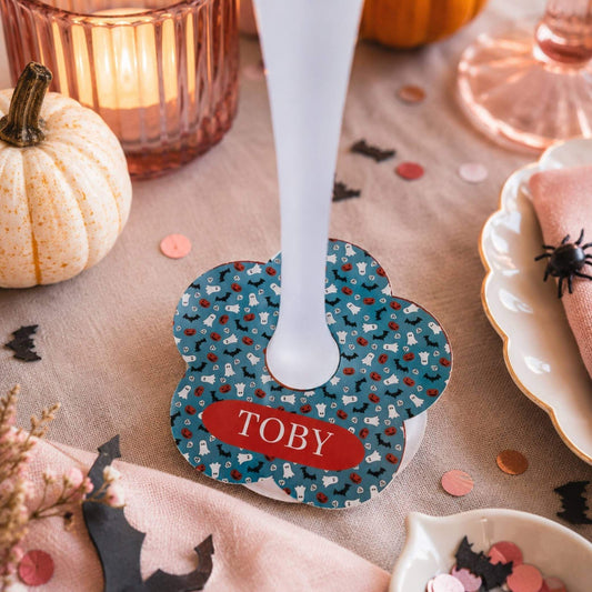 Halloween Mix personalised name drink marker with a ghost and pumpkin design, featuring the name 'Toby'.