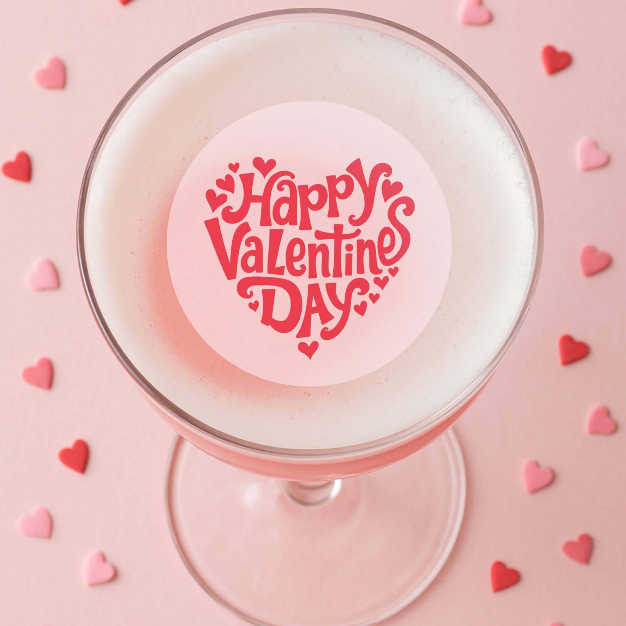 Valentines Day edible drink toppers on a cocktail with heart decorations for a festive celebration.