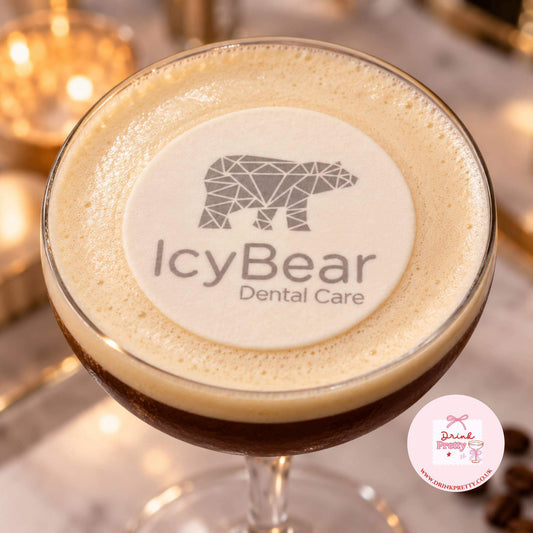 Upload your logo edible cocktail toppers displayed on a cocktail with IcyBear Dental Care logo on top.