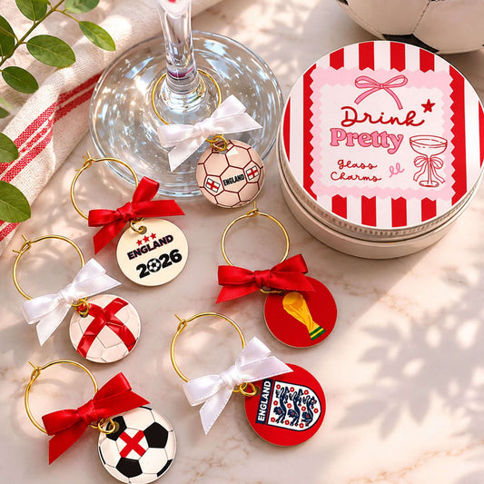 Tennis Ball Wine Glass Charms Set of 6 featuring unique designs and vibrant ribbons.