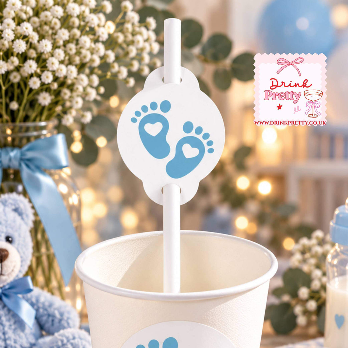Blue Baby Shower Straw Toppers with baby feet design in a cup for a baby boy shower celebration.