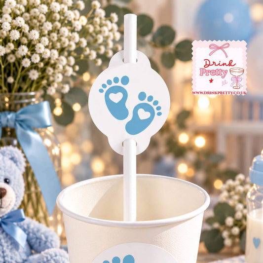 Blue Baby Shower Straw Toppers with baby feet design in a cup for a baby boy shower celebration.