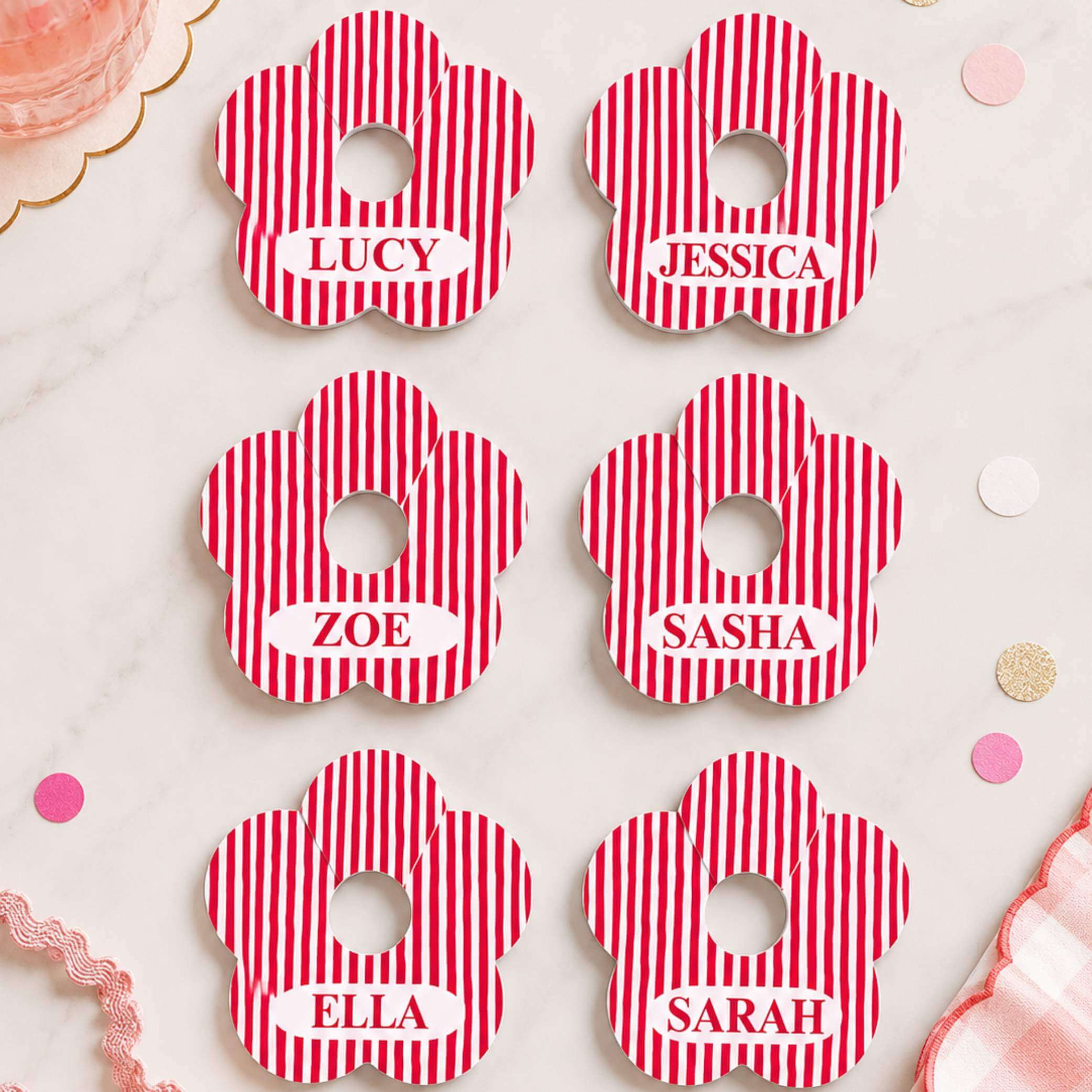 Red & white stripe personalised name drink marker - flower-shaped with names Lucy, Jessica, Zoe, Sasha, Ella, and Sarah.