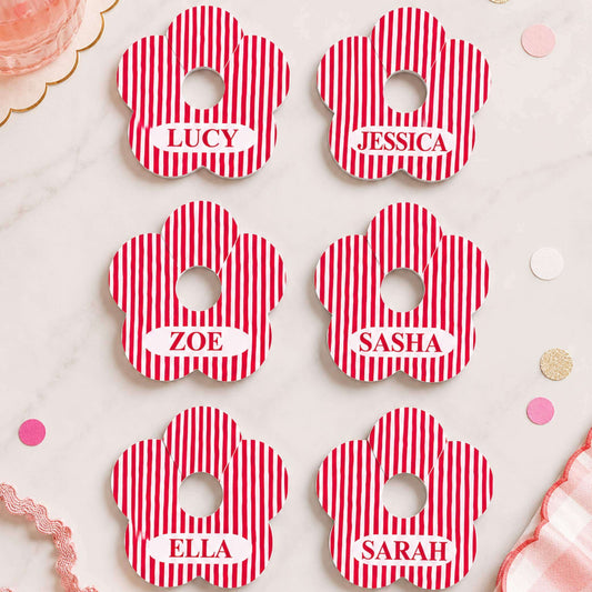 Red & white stripe personalised name drink marker - flower-shaped with names Lucy, Jessica, Zoe, Sasha, Ella, and Sarah.