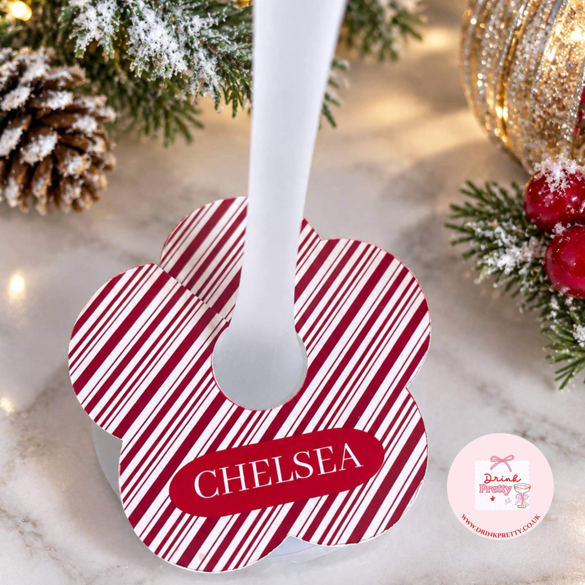 Christmas Red & White Stripe Personalised Name Drink Identifiers with name Chelsea on a floral marker.
