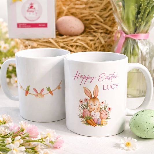 Two Easter-themed mugs with decorative elements on a table with flowers and eggs.