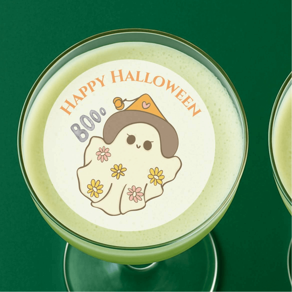 Boo Halloween edible drink topper illustration with a cute ghost and Halloween text on a cocktail glass.
