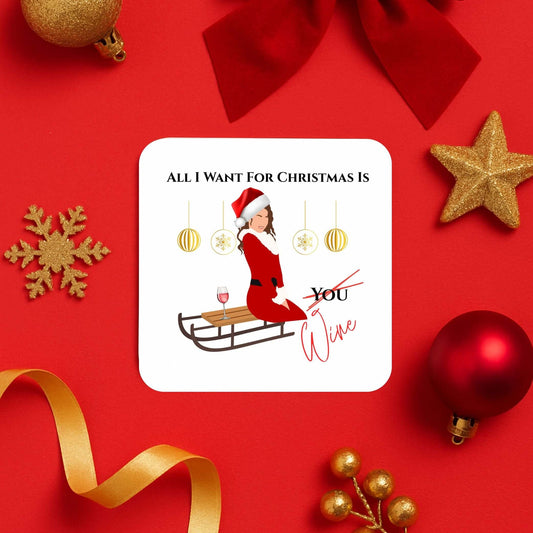 Christmas wine drink coaster with festive design saying 'All I Want For Christmas Is Wine' featuring a woman in holiday attire.