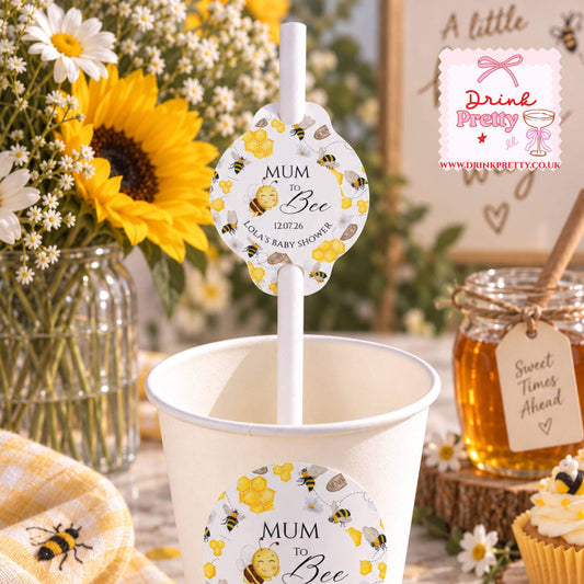 Mum to bee straw topper in a cup for a bee-themed baby shower celebration.