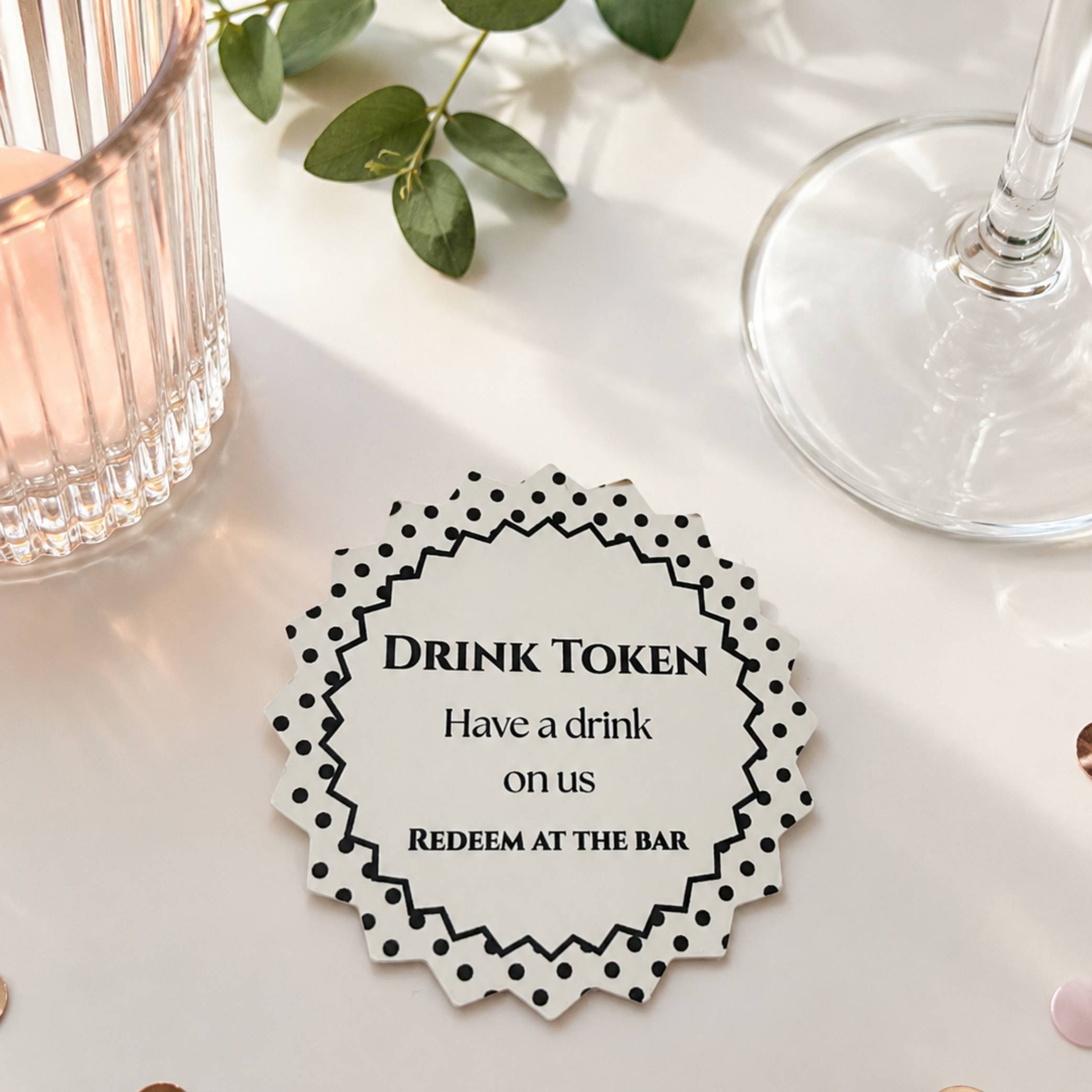 Polka dot drink tokens pack of 50 with text 'Drink Token Have a drink on us Redeem at the bar' on a stylish token.