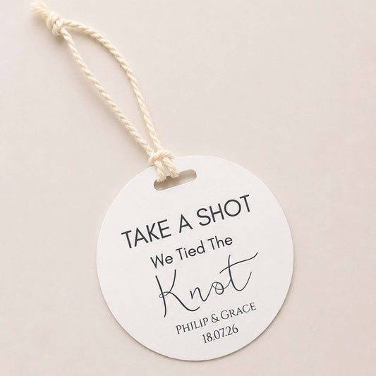 Take A Shot wedding favour bottle tags with We Tied The Knot design and personalized names.
