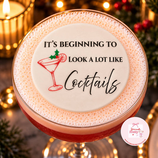 It's Beginning To Look A Lot Like Cocktails Toppers on a festive cocktail with decorative elements.